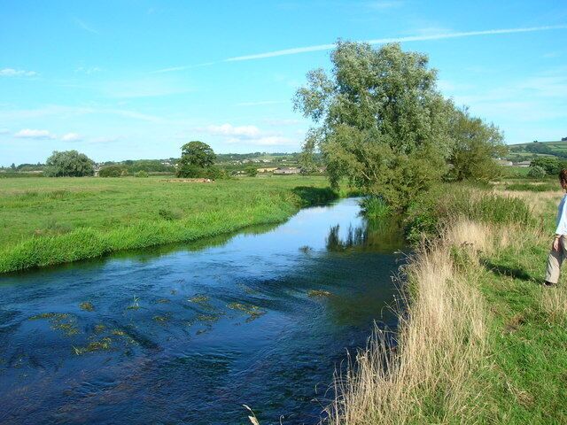 River Axe. fast flowing stretch of the river just below its junction with the River Yarty