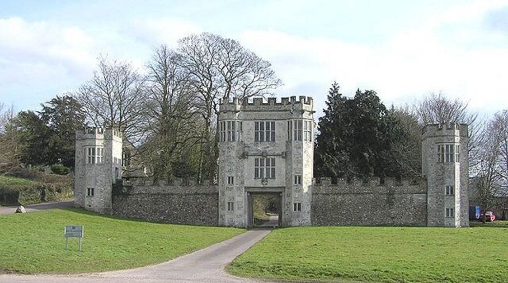 Entrance to Shute Barton. Parish church can just be seen behind the left end turret
