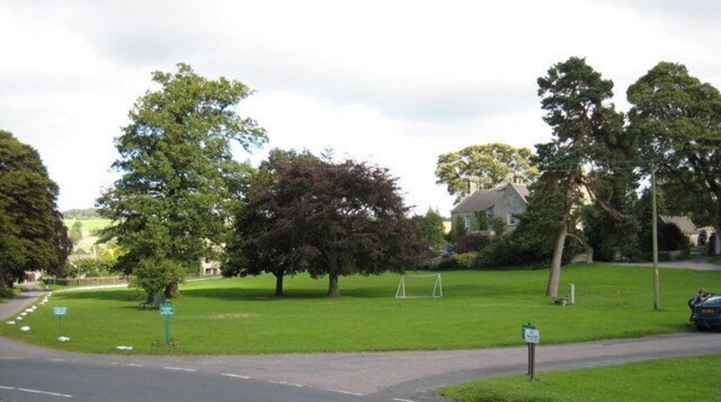 The village green in Romaldkirk, County Durham This photograph shows a view of the village green in Romaldkirk, a small village in the Teesdale area of County Durham. The picture was taken from the gated entrance to the church grounds looking in a south-easterly direction towards Low Garth.