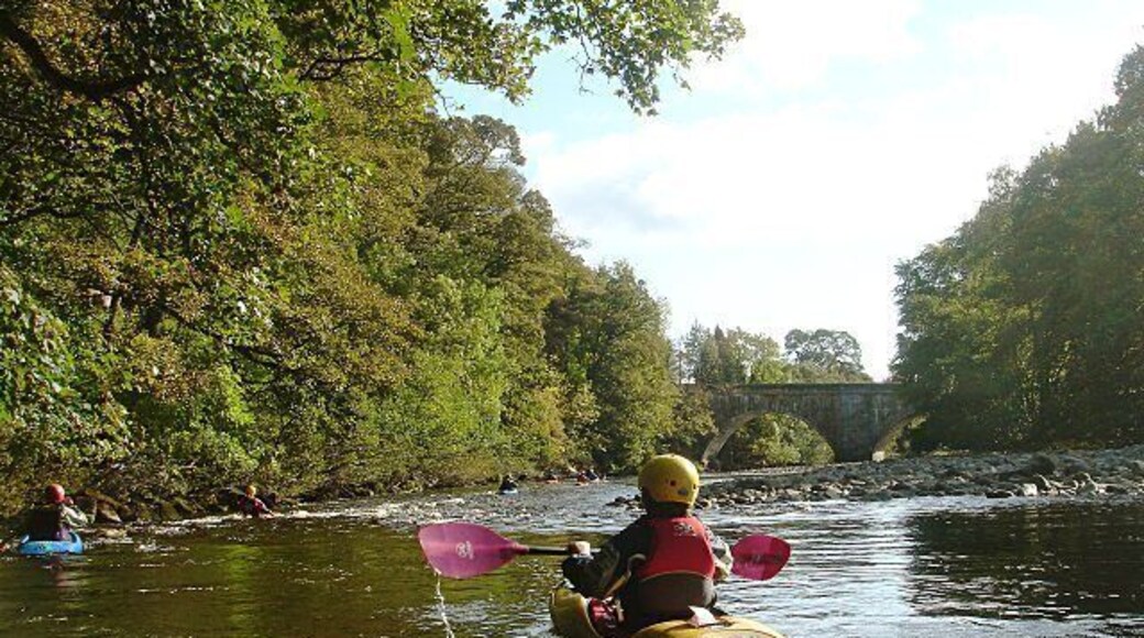 Eggleston Bridge approach The Tees 'Racing stretch' starts at Eggleston bridge, but it is an awkward place to put on with a large group, and for a party including relative novices, it is usually a good idea to warm up on the section down from Middleton, since the river is concentrated into more of a gorge on the next section and is noticeably harder. The level of the river in dry weather is largely controlled by releases from Cow Green reservoir and in October 2009 this had been releasing a good quantity of water into the river, making it one of the few local paddling venues with enough flow. Unfortunately, after we had committed to this trip, the flow was much reduced, so here we are at the end of the long gentle section having had a bit of a rock bash to get here.