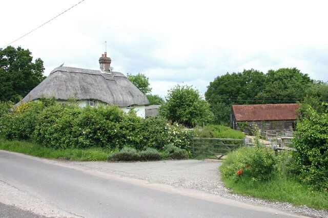 Thatched cottage and outbuilding