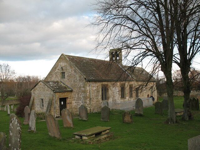 St Andrew's Church Finghall., near to Finghall, North Yorkshire, Great Britain. Although this 12th century church is now the parish church of Finghall, it must once have served the villagers of nearby Akebar. Fields close to the church show earthworks from a former village, whilst other fields are full of residential caravans.