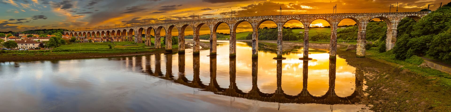 Berwick, Northumberland, UK, June 19, 2024; sunset aerial view of the Royal Border Bridge Viaduct, Berwick, Berwick-upon-Tweed, Northumberland, England, UK.