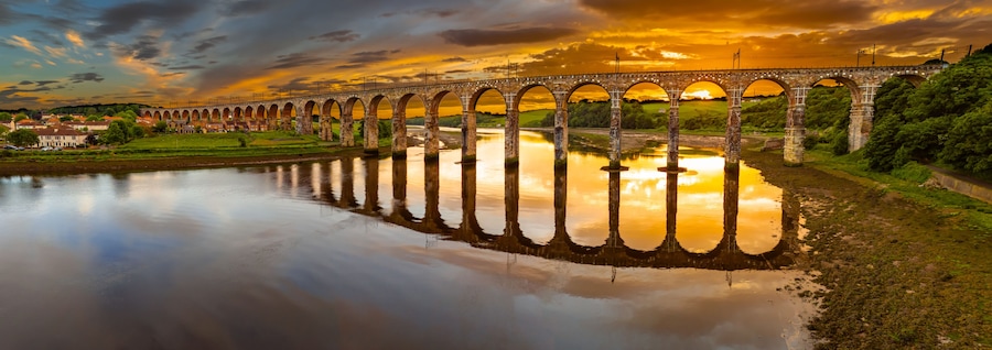 Berwick, Northumberland, UK, June 19, 2024; sunset aerial view of the Royal Border Bridge Viaduct, Berwick, Berwick-upon-Tweed, Northumberland, England, UK.