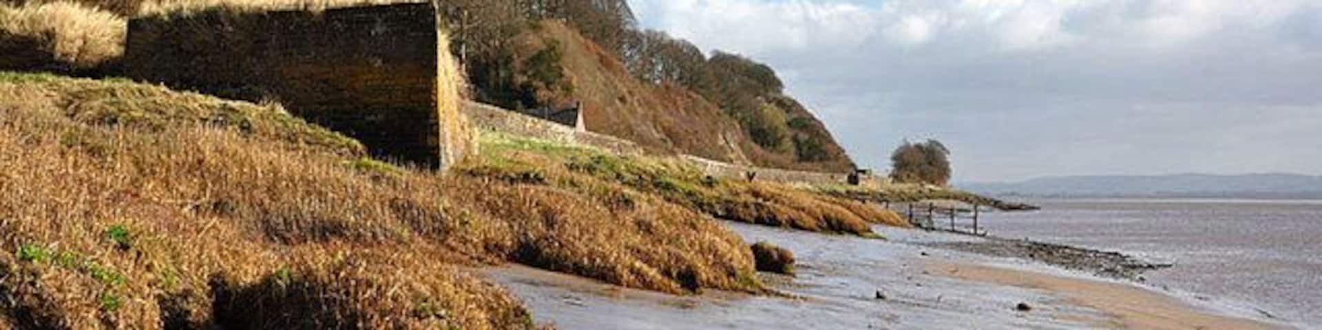 Severn Foreshore The brick structure I presume used to be a dock, the wall protects the railway from Gloucester to Chepstow.