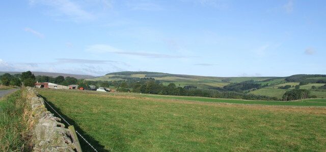 Allenshields Farm View looking across pasture at Allenfields Farm with Newbiggin Fell in the background.