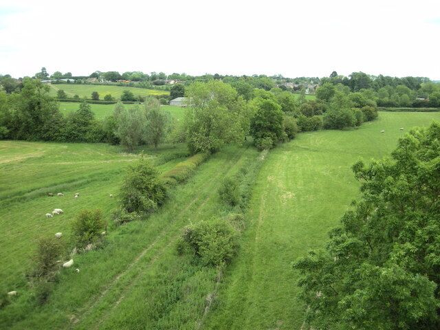 View from Helmdon Viaduct, Northamptonshire, looking east along the former route of the Stratford-upon-Avon and Midland Junction Railway toward Helmdon village and the site of the former SMJR station
