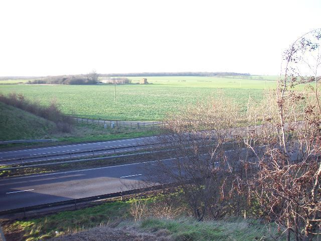 Great North Road (A1) A1, Great North Road as it passes Lenton Lakes to the west of Brampton Village. Open fields beyond surrounding Brampton Lodge. Brampton Wood TL1870 TL1869 beyond.
