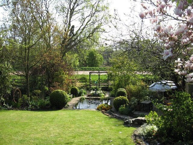 Poplar Cottage garden This cottage garden is part of the Gardens Open scheme raising money for the upkeep of local churches. It is one third of an acre of flower arrangers garden with a wide range of plants, bulbs and spring flowers. Just an English garden at its best.
