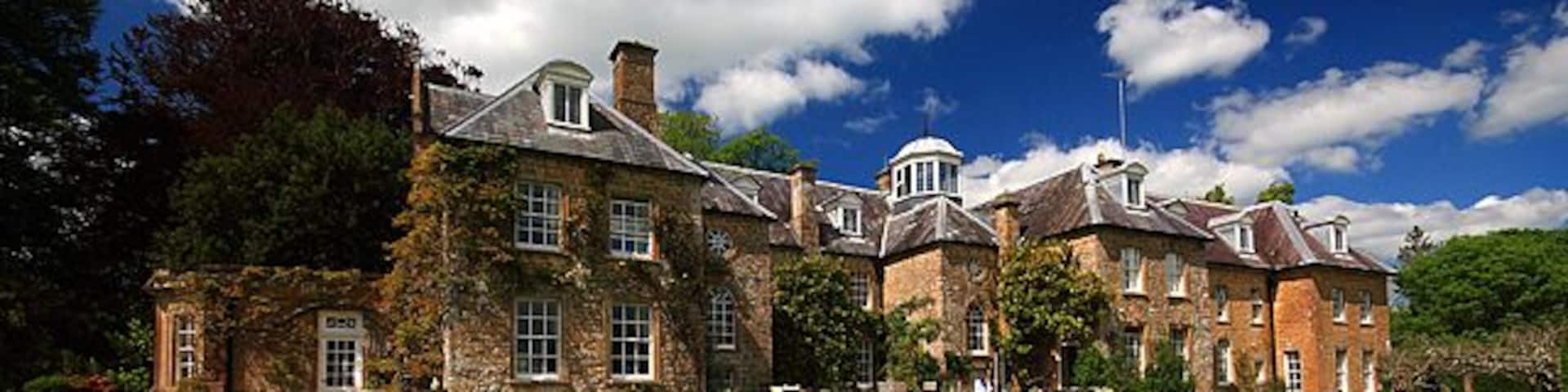 Slape Manor south front A Grade II* manor house having a C17 core, with late C18 refenestration, and a C19 extension.