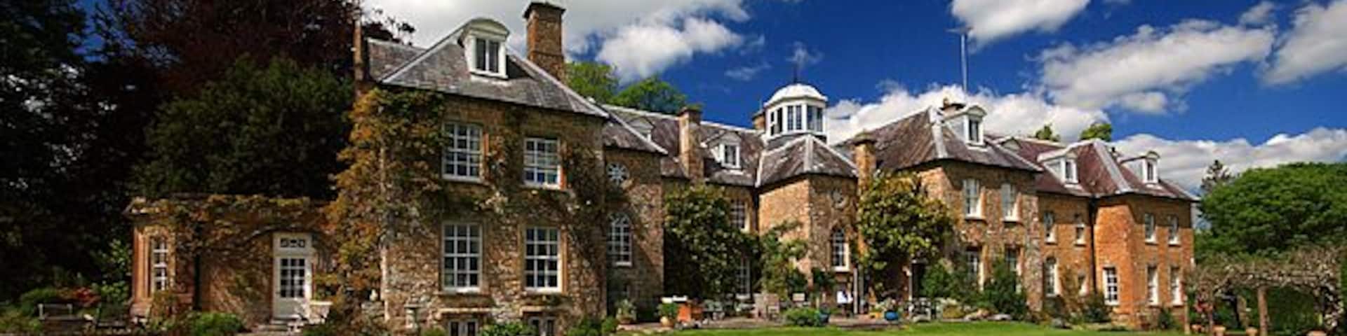 Slape Manor south front A Grade II* manor house having a C17 core, with late C18 refenestration, and a C19 extension.
