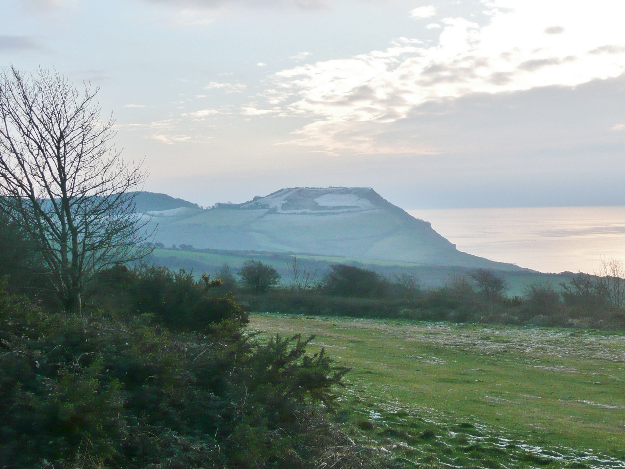 View of en:Golden Cap taken from en:Stonebarrow Hill in January 2013.