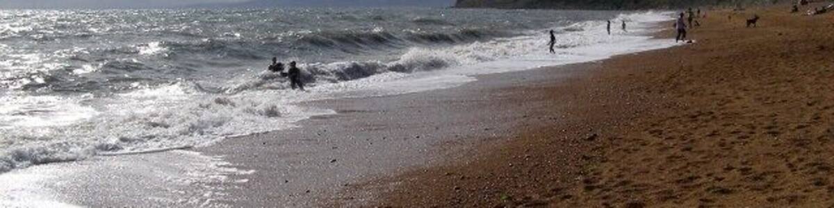 Beach at Eype's Mouth Looking west along the shingle beach at Eype's Mouth, with Thorncombe Beacon in the middle distance. In the far distance, across the bay, is the start of the Devon coast, around Lyme Regis.