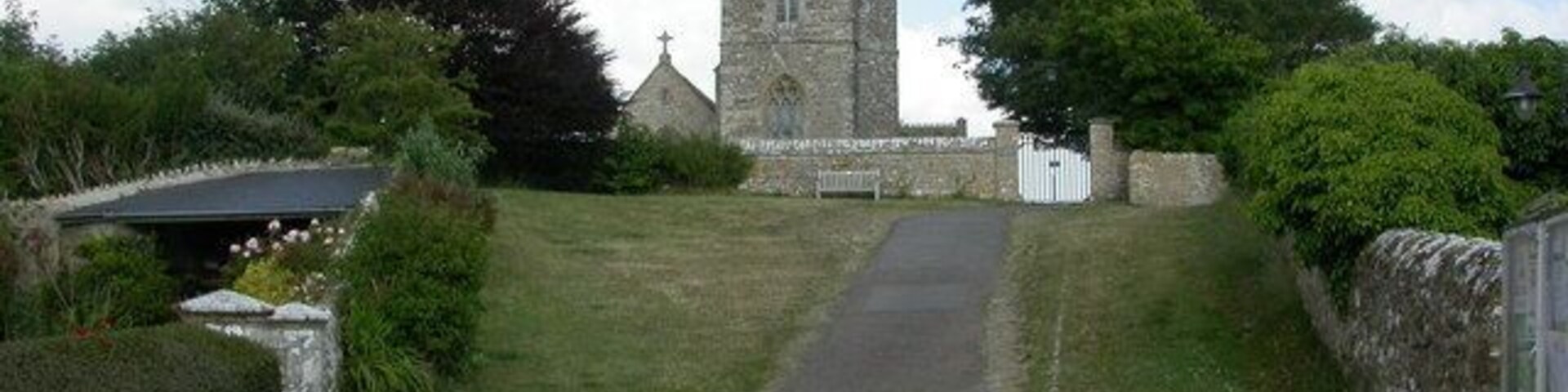 View east along the lane in Shipton Gorge, Dorset that leads to St Martin's parish church