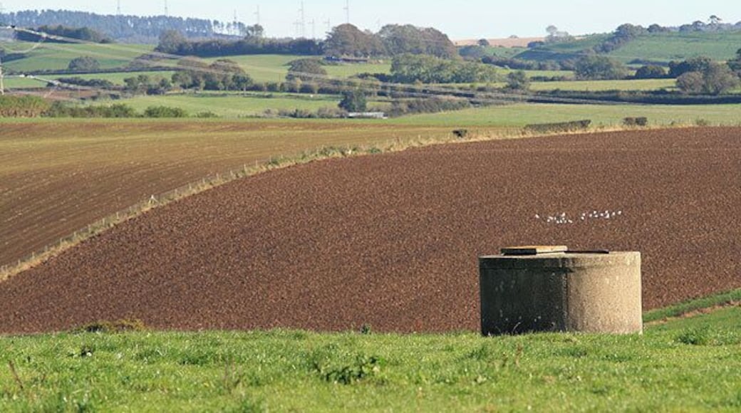 Farmland near Lower Ash I think that the concrete structure is for water storage.