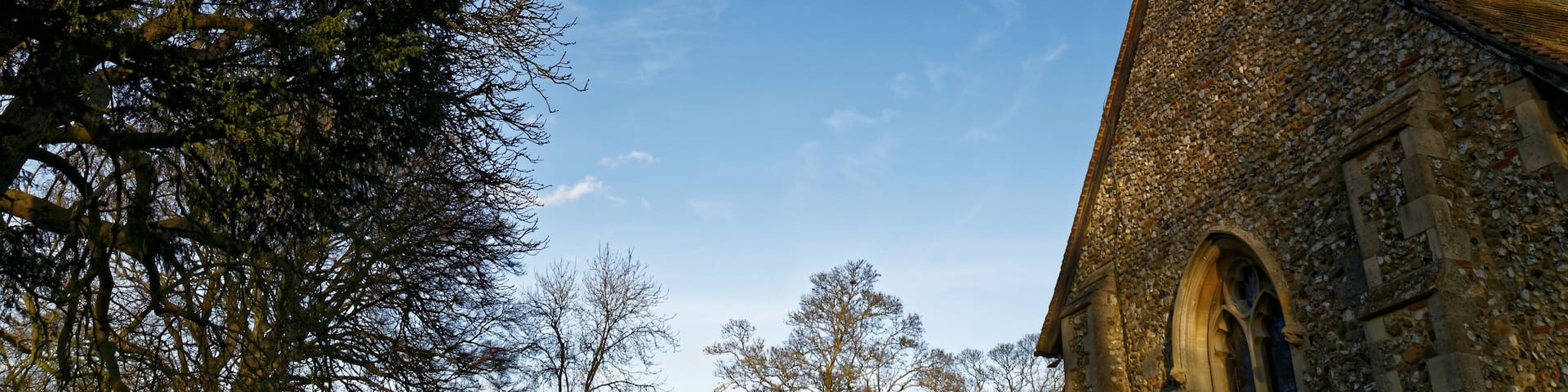 A Ryanair Boeing 737 passenger aircraft in descent to London Stansted Airport over the south west of St Mary the Virgin's Church, Broxted, Essex, England. Software: JPEG file optimized and/or cropped and/or spun with DxO OpticsPro 10 Elite and Adobe Photoshop CS2.