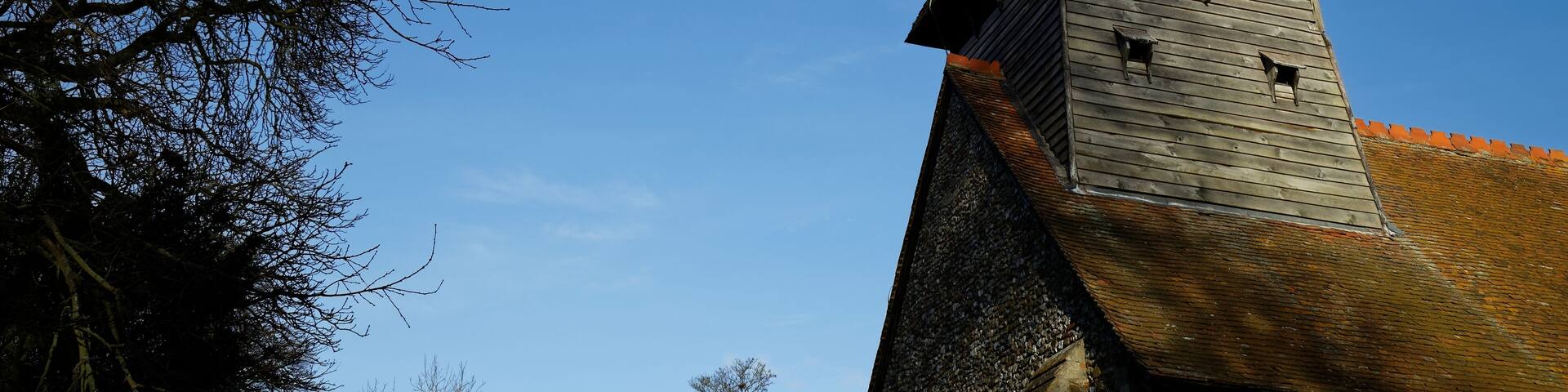 A Ryanair Boeing 737 passenger aircraft in descent to London Stansted Airport over the south west of St Mary the Virgin's Church, Broxted, Essex, England. Software: JPEG file optimized and/or cropped and/or spun with DxO OpticsPro 10 Elite and Adobe Photoshop CS2.