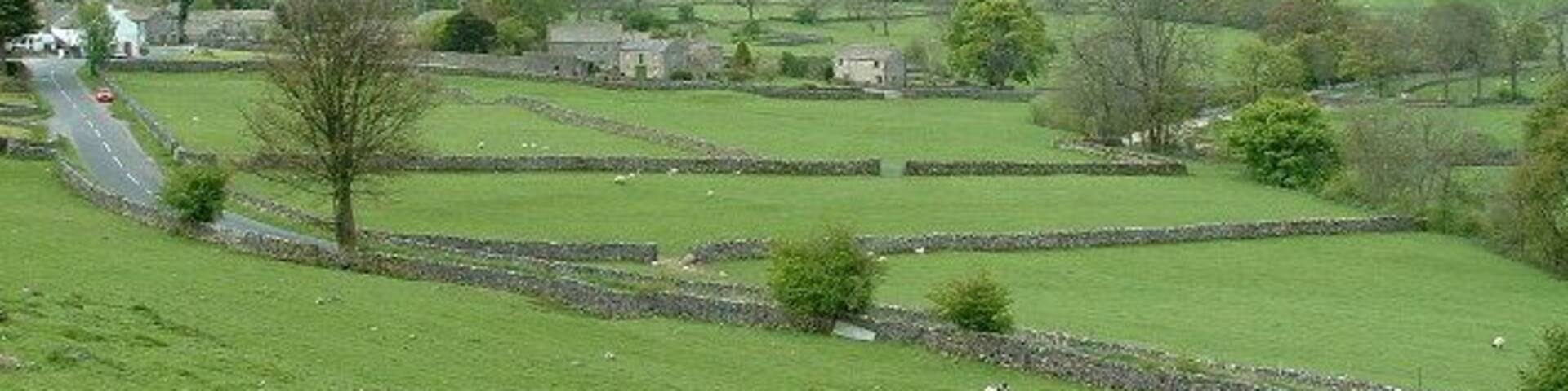Buckden & River Wharfe. the road is the B6160 Buckden Wood lane