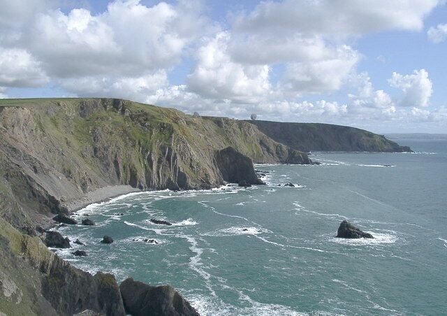 South from Higher Sharpnose Point. View south from Higher Sharpnose Point showing a couple of antennas on the western edge of the Satellite Station