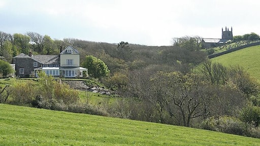 St Gennys: nearing Churchtown With St Gennys church on the skyline. Seen from the link path between churchtown and the South West Coast Path
