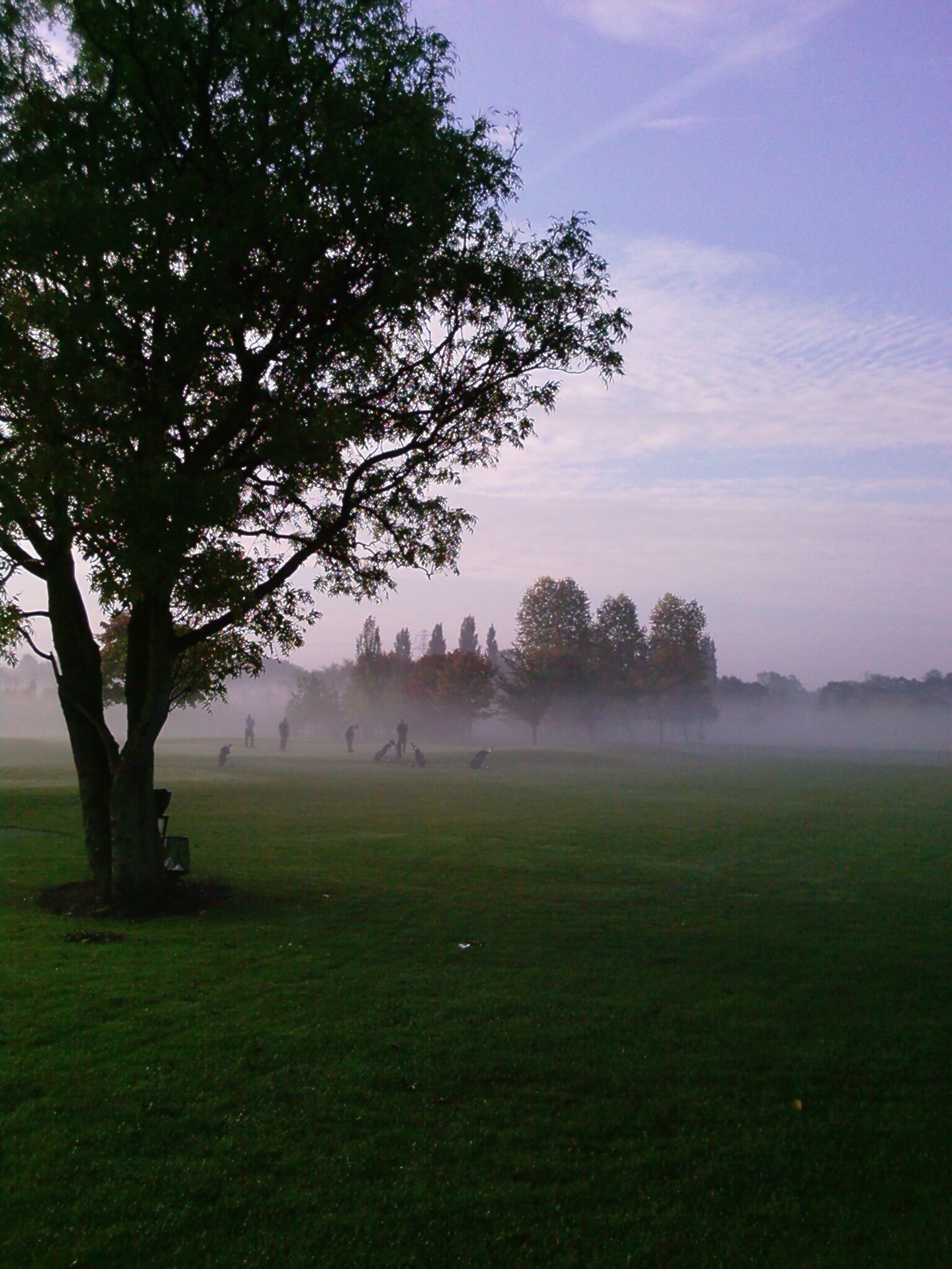 Putting on the 7th green, 9 hole PETER ALLIS course BRANSTON GOLF & COUNTRY CLUB.