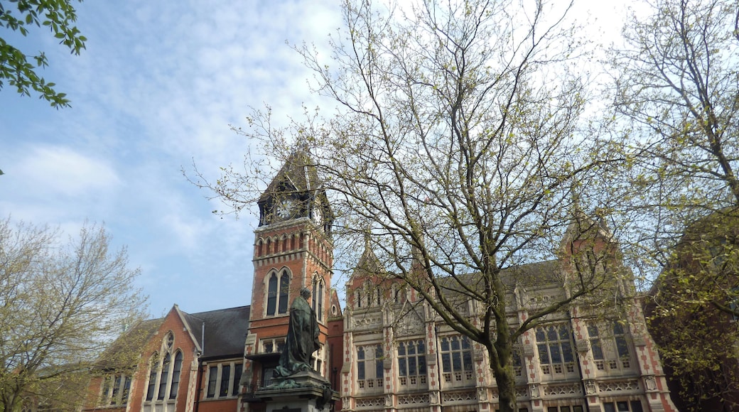At King Edwards Place in Burton upon Trent. In the Shobnall area of Burton. Burton upon Trent Town Hall. The Town Hall is Grade II listed. Town Hall, Shobnall KING EDWARD PLACE
1.
5369
Town Hall
SK 2323 SE 5/95
SK 22 SW 6/95
II GV
2.
1878 and later. Gothic style. Red brick with stone dressings. The original
portion built by Reginald Churchill for Michael Thomas Bass. 2 storeys with
gables. Each bay has a 3-light window in foil-headed stone surround with mullions
and transom, the lights with foil heads and quatrefoil panels below; elaborate
decoration with bands of blind quatrefoils at 1st storey and to parapet; coped
gabled and stone piers with pnnacles supporting figures of lions bearing standards.
Later portion, on left-hand side, is of 1894 and in similar style, with clock
tower and doorway below in stone surround and with wrought iron porte-cochere.
2-storeyed wing to left is of 3 bays, each with 3-light stone mullioned window,
the centre bay projecting and with gable and angled buttresses. Elaborate
single-storeyed wing on left-hand side containing Concert Hall has various
projecting gabled bays with pointed arched windows and an arched doorway to
right. Tiled roofs.
Listing NGR: SK2400123438
The statue is Grade II listed Statue of Michael Arthur Bass, Shobnall KING EDWARD PLACE
1.
5369
Statue of Michael Arthur Bass
SK 2323 SE 5/96
II GV
2.
1911. Statue of the 1st Baron Burton (1837-1909) by F W Pomeroy. A conventional
life-sized bronze statue on a stone plinth.
Listing NGR: SK2400023405
This text is a legacy record and has not been updated since the building was originally listed. Details of the building may have changed in the intervening time. You should not rely on this listing as an accurate description of the building. Source: English Heritage Listed building text is © Crown Copyright. Reproduced under licence.
