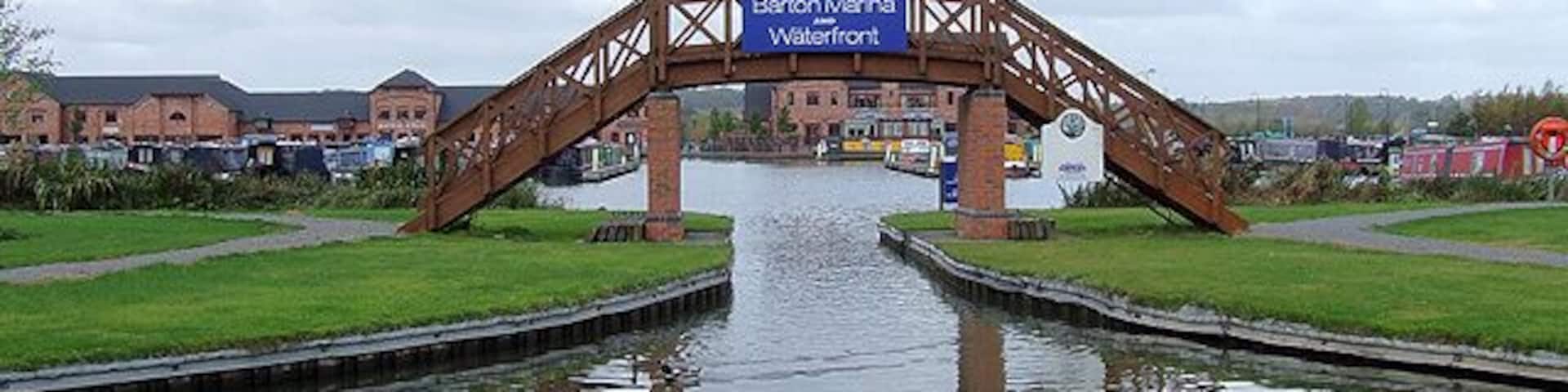 Entrance to Barton Marina, Staffordshire. Note the extra development since this 2006 image. 358258 The name has changed from "Barton Turns Marina" to "Barton Marina and Waterfront". It now has its own restaurant and pub, "The Waterfront", shopping galleries, including a butcher and a baker who bakes on the premises!