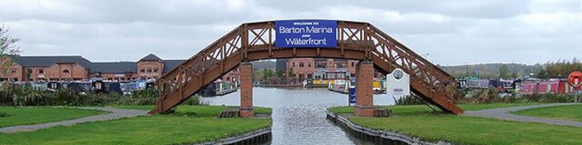 Entrance to Barton Marina, Staffordshire. Note the extra development since this 2006 image. 358258 The name has changed from "Barton Turns Marina" to "Barton Marina and Waterfront". It now has its own restaurant and pub, "The Waterfront", shopping galleries, including a butcher and a baker who bakes on the premises!