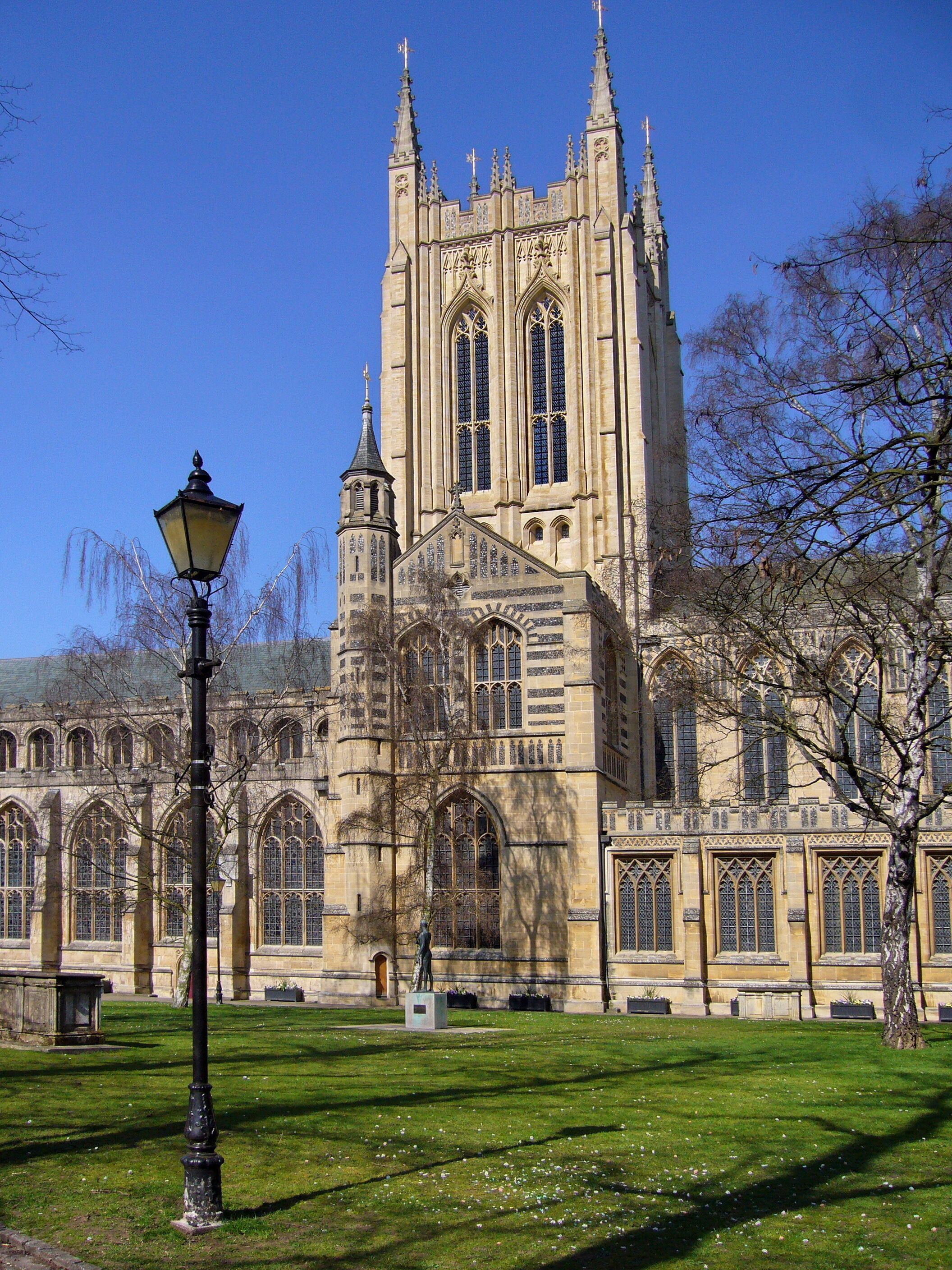A large Gothic-style cathedral with tall spires and arched windows.