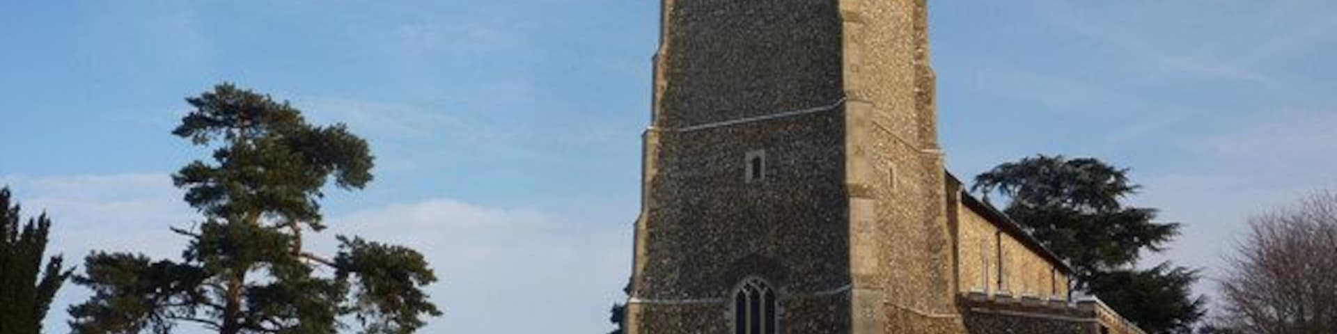 Parish church of St John the Divine, Elmswell, Suffolk, seen from the southwest in snow