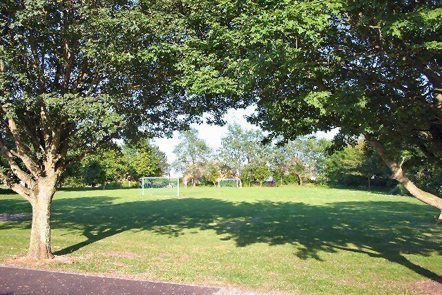 Brockley Green playing field. A small playing field, with a half-size football pitch, viewed from the village hall.