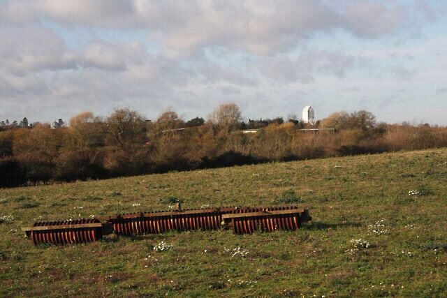 Drinkstone Post Mill The mill is viewed from the footpath at Bishop Karney Green.