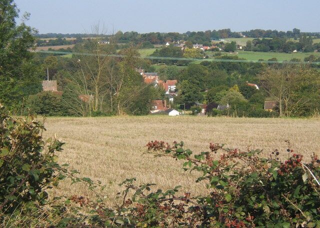 Overlooking Hartest village Cross Green in the distance. Seen from the footpath dropping down from Hartest Hill.