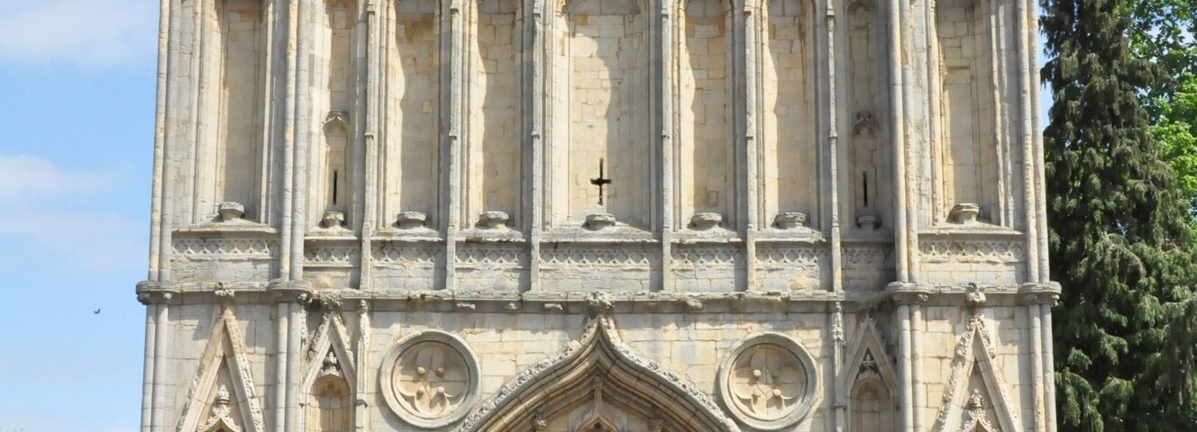 The Abbey Gate is the main entrance to the gardens of the Bury St Edmunds Abbey. It's also right across the street from a small square on the edge of the pedestrian street leading to the heart of town.