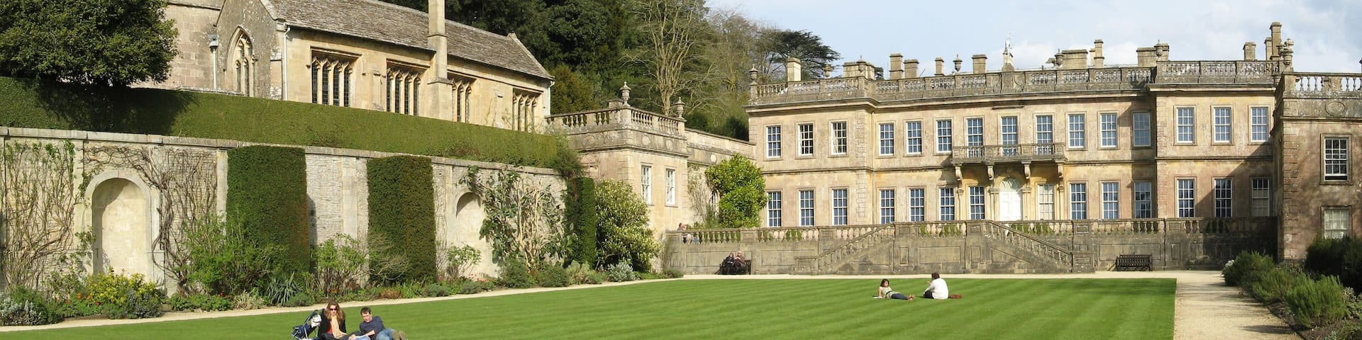 West side of Dyrham Park house and St Peter's Church, from west lawn.