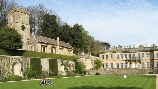 West side of Dyrham Park house and St Peter's Church, from west lawn.