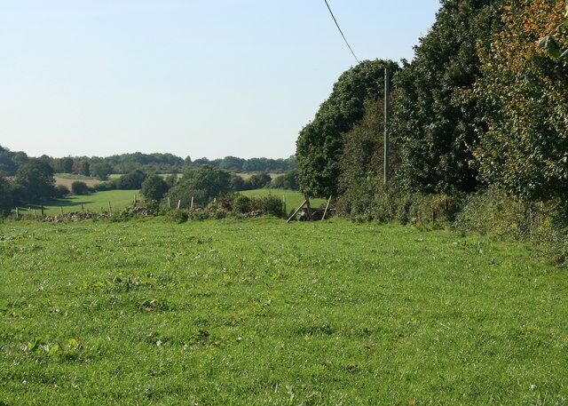 View west from Bath Road, Colerne Bath Road joins Colerne's northern bypass near here. This is close to the head of the valley of the Lid Brook which rises a few hundred yards to the west.