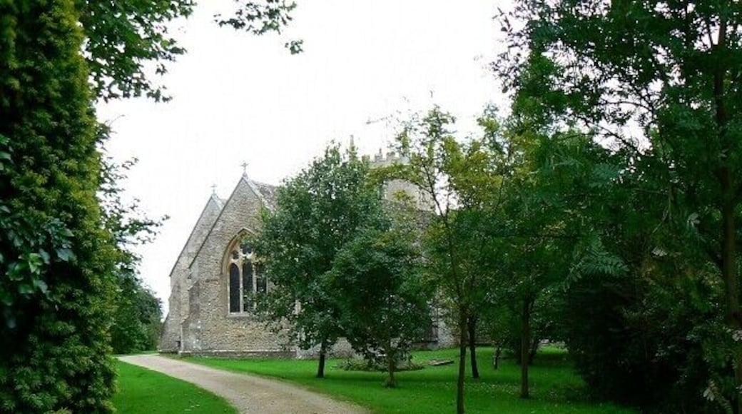 The path to the Church of All Saints, Christian Malford All the path visible is in this square. The church is one of those that sit across a gridline. In this image the eastern end of the church just to the right of the path is in this square. The tower in the background is in ST9578. The viewpoint is just under 40 metres from the western gridline.
