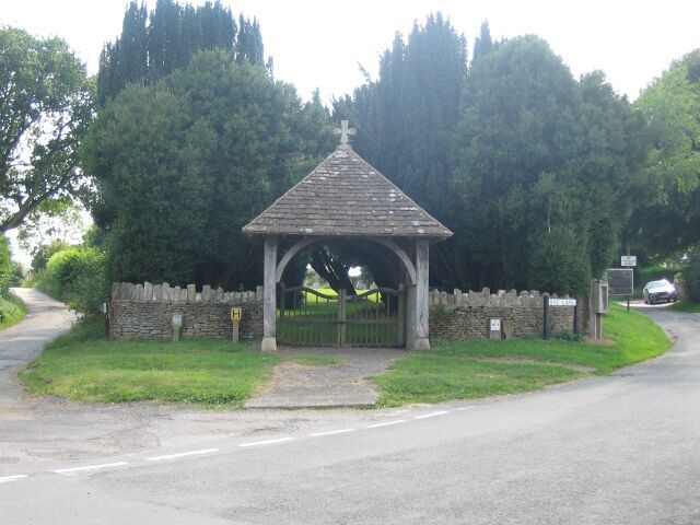 Cemetery gates, Biddestone. A view looking southwest towards the gates to the cemetery at Biddestone.