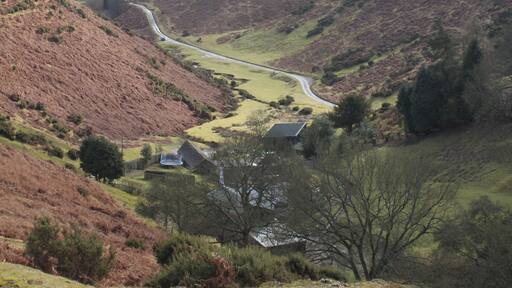 Valley below Gogbatch near Womerton View from an outcrop above Gogbatch with Caer Caradoc Hill in background.