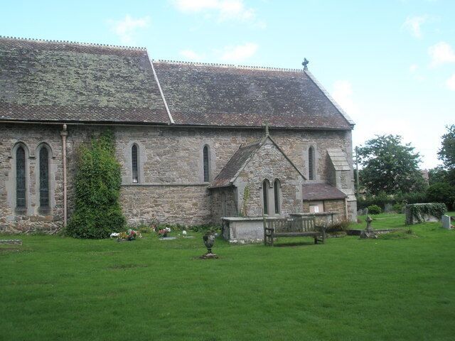 Seat in the churchyard at St Peter, Rushbury