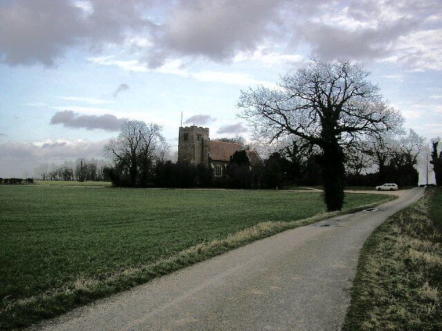 St Andrew, Weeley. Like many other Essex churches, this one stands next to the manor house (Weeley Hall - behind the church from this viewpoint) but remote from any other houses.