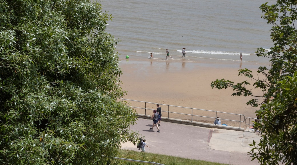 Walking to the beach with granddad. Boy and man. Stairs.Coast. Frinton on sea.. Northsea. England. Essex. UK. Great Brittain.