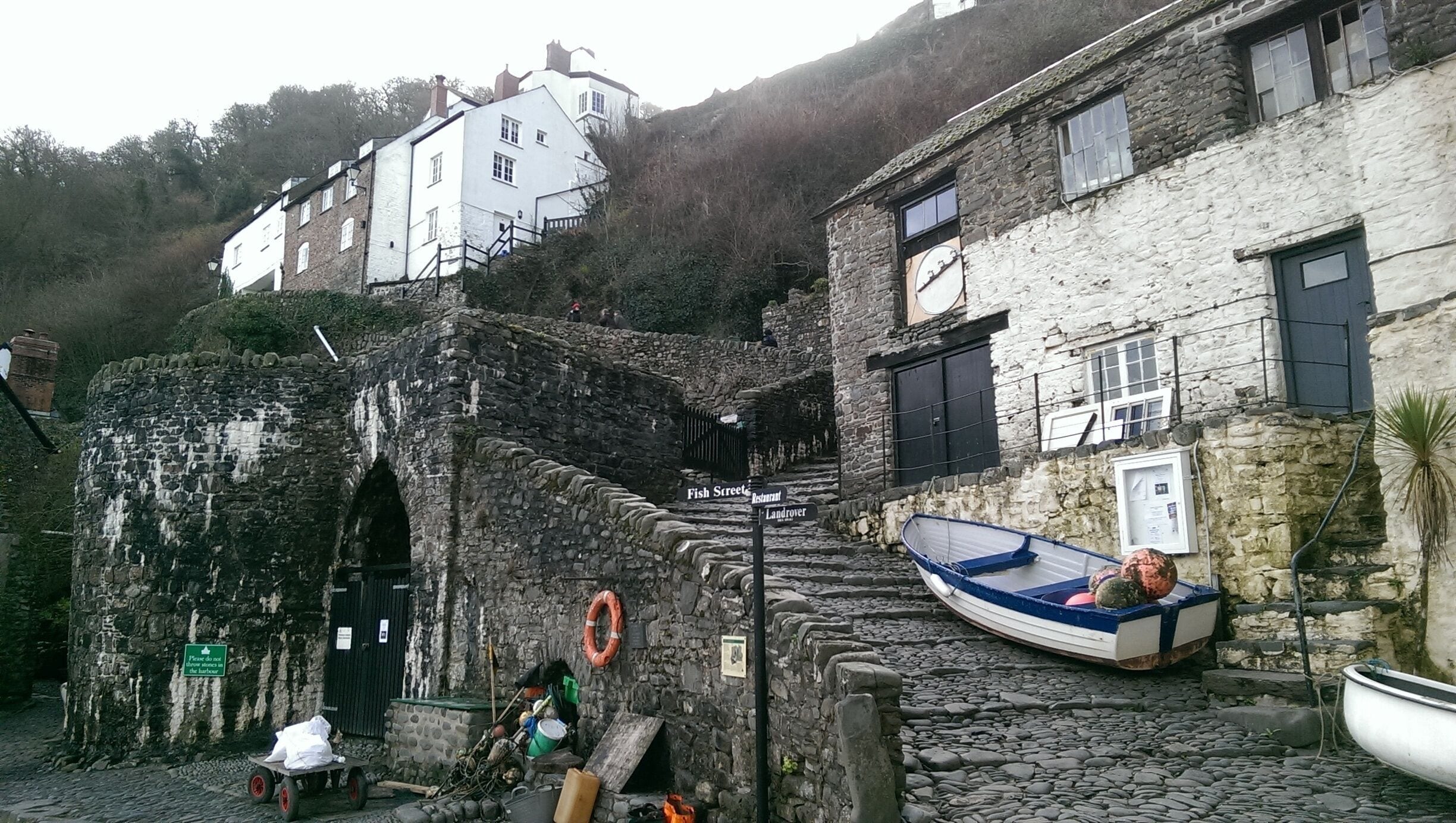 The ancient town of Clovelly is now a major tourist attraction in Devon, England. It was traditionally a fishing village, and has been associated with just three families since the middle of the 13th century. No vehicles can access its steep, cobblestone streets, and goods must largely be delivered by sledge. We visited in winter, and there were very few tourists around, a good time to be there. While touristy, Clovelly is very picturesque and unique. The history is interesting too. 
