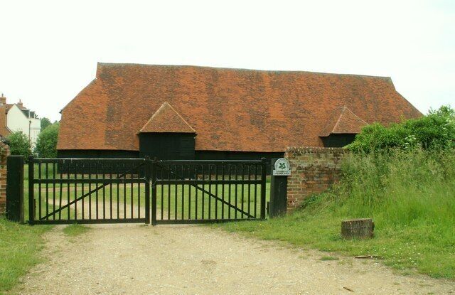 Grange Barn, Little Coggeshall, Essex. Grange Barn is open to the public and in the care of the National Trust. It was once part of Grange Farm. The barn was built in 1500, about 130ft long with a king-post roof. It has six bays, aisles, two porches and a huge tiled roof.
