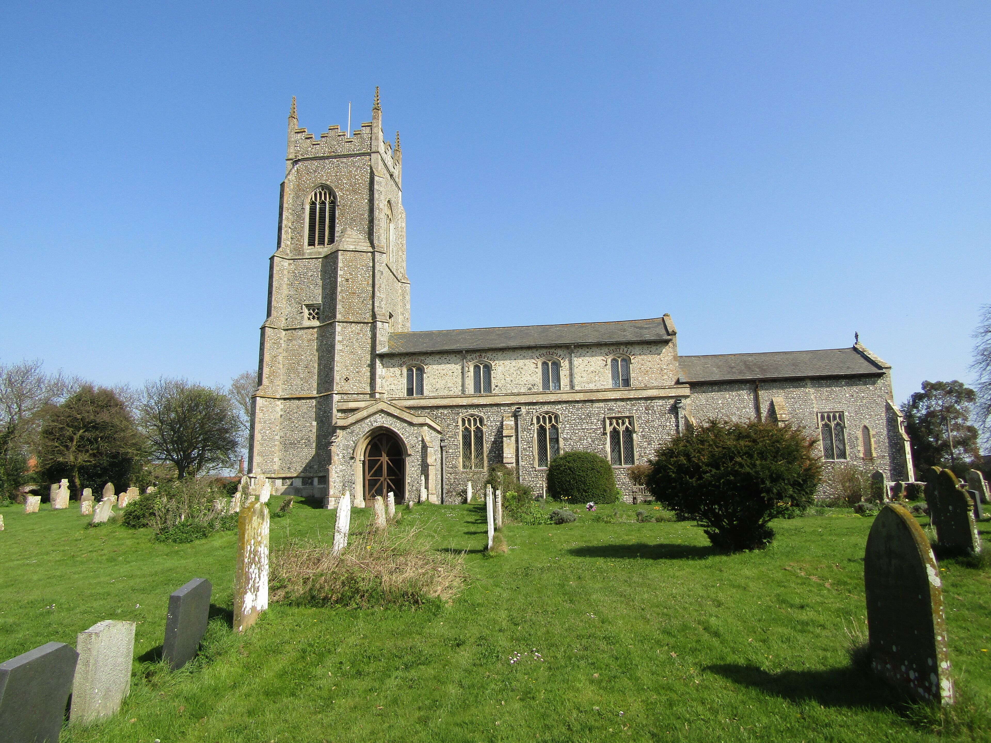The south facing elevation of the parish church of Saint Mary the Virgin which is located within the village of Northrepps, Cromer, Norfolk.