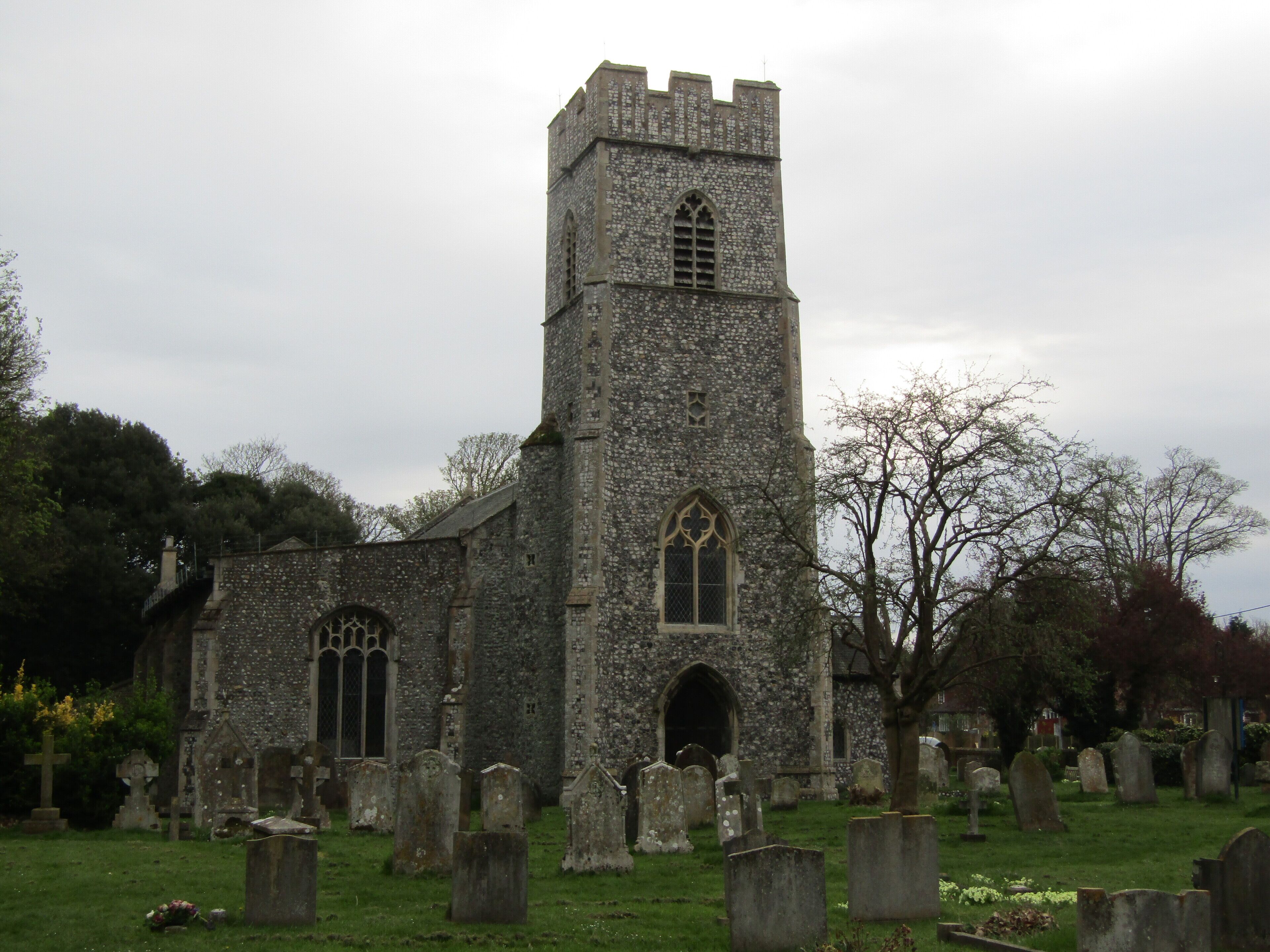 A set of wooden gates for access to the church yard of the parish church of Saint Martin which is located on Cromer Road within the village of Overstrand, Cromer, Norfolk.