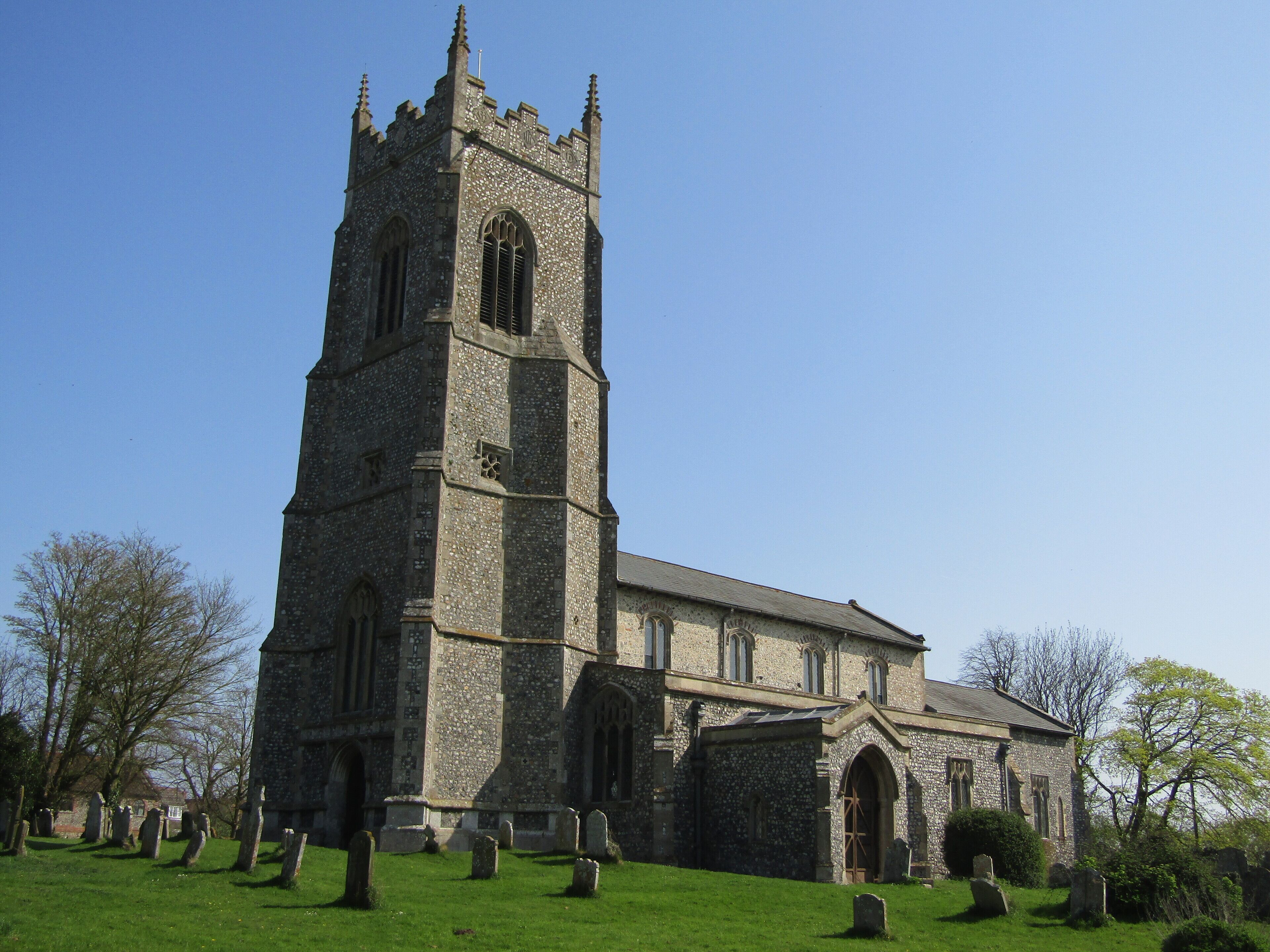 The south facing elevation of the parish church of Saint Mary the Virgin which is located within the village of Northrepps, Cromer, Norfolk.