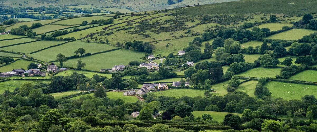 Widecombe lies in a valley created by the East Webbern river. The name Widecombe is derived from 'Withy-combe' - meaning 'Willow Valley'.
Your first glimpses of the village of Widecombe in the Moor is of a picturesque little hamlet that nestles snuggly between rolling green hills of Devon farmland, with a spectacular backdrop of granite tors and moorland. The village has a coach and car park, as well as the usual collection of craftshops and tea rooms serving refreshments.
At the centre of the village is a triangular shaped green, with a collection of mature trees. The trees have seating fixed around their trunks, allowing you to sit and relax, whilst you enjoy the stunning views of the church set against a moorland vista.
The church of St Pancras is aptly named the 'Cathedral of the Moors'. The church spire is a well known local landmark, visible for many miles. The church was originally built in the 14th century, and enlarged over the following two centuries, partly on the proceeds of the local tin mining trade.
The village of Widecombe in the Moor, is world-famous for its fair, held annually on the second Tuesday in September. The Fair gave rise to the well-known folksong 'Widecombe Fair' and the characters of Uncle Tom Cobley and All. The village fair probably began as a simple market, but it has grown over the years into a local institution, with gymkhana, and pony shows, demonstrations, competitions, sheep and cattle shows, numerous sideshows, races and refreshments.
#ourplanetdaily #widdecombeonthemoor #dartmoornationalpark #park
#beautifulplanet #depthsofearth #earhpix #earthfever #ig_legit #liveforthestory #gooutside #beautifulplanet #earthfocus #anglomania #englishcountryside #greatbritain #visitdevon #southdevon #devonlife #exploredevon #beautifuldestinations #capturingbritain #thedevonnetwork #visitengland #wanderlust #godartmoor #visitdartmoor #ilovesouthdevon #ordnancesurvey #godartmoor #uk