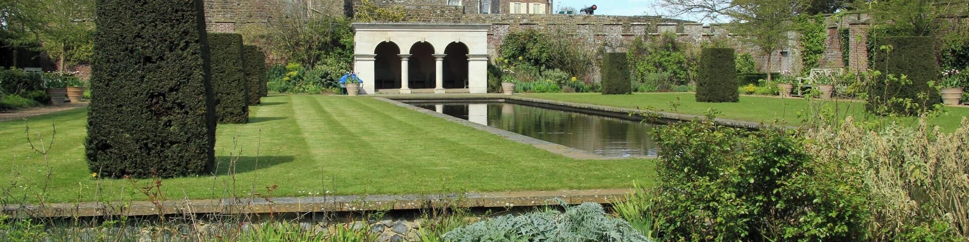 Built during the reign of King Henry VIII, Walmer Castle is one of the most fascinating visitor attractions in the South East. Originally designed as part of a chain of coastal artillery defences it evolved into the official residence of the Lord Warden of the Cinque Ports. The Duke of Wellington held the post for 23 years and enjoyed his time spent at the castle and in recent years Her Majesty Queen Elizabeth the Queen Mother made regular visits to the castle. The armchair in which Wellington died and an original pair of 'Wellington boots' along with some of the rooms used by the Queen Mother are among the highlights. And with the magnificent gardens, a woodland walk and some excellent bird spotting there's something for everyone to enjoy. There is also a pleasant cycle path along the beach front to nearby Deal Castle.